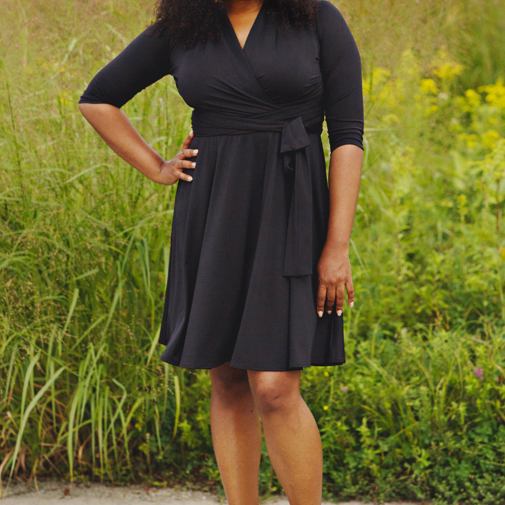 
                  
                    Ruby Dress in Solid Black by Karina Dresses
                  
                
