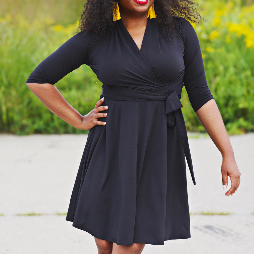 
                  
                    Ruby Dress in Solid Black by Karina Dresses
                  
                