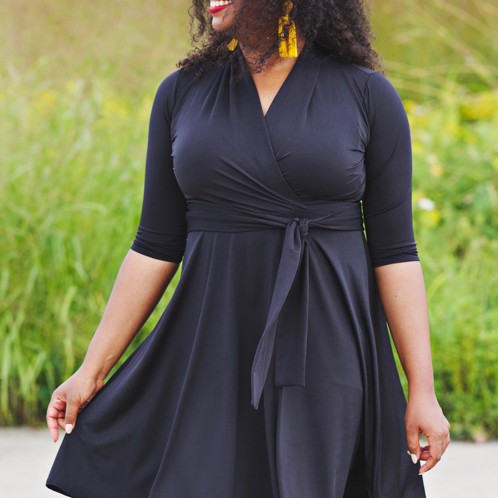 
                  
                    Ruby Dress in Solid Black by Karina Dresses
                  
                